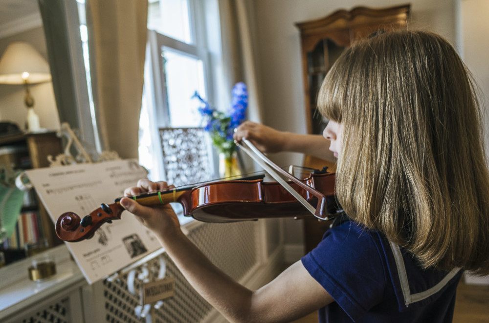 Child playing violin